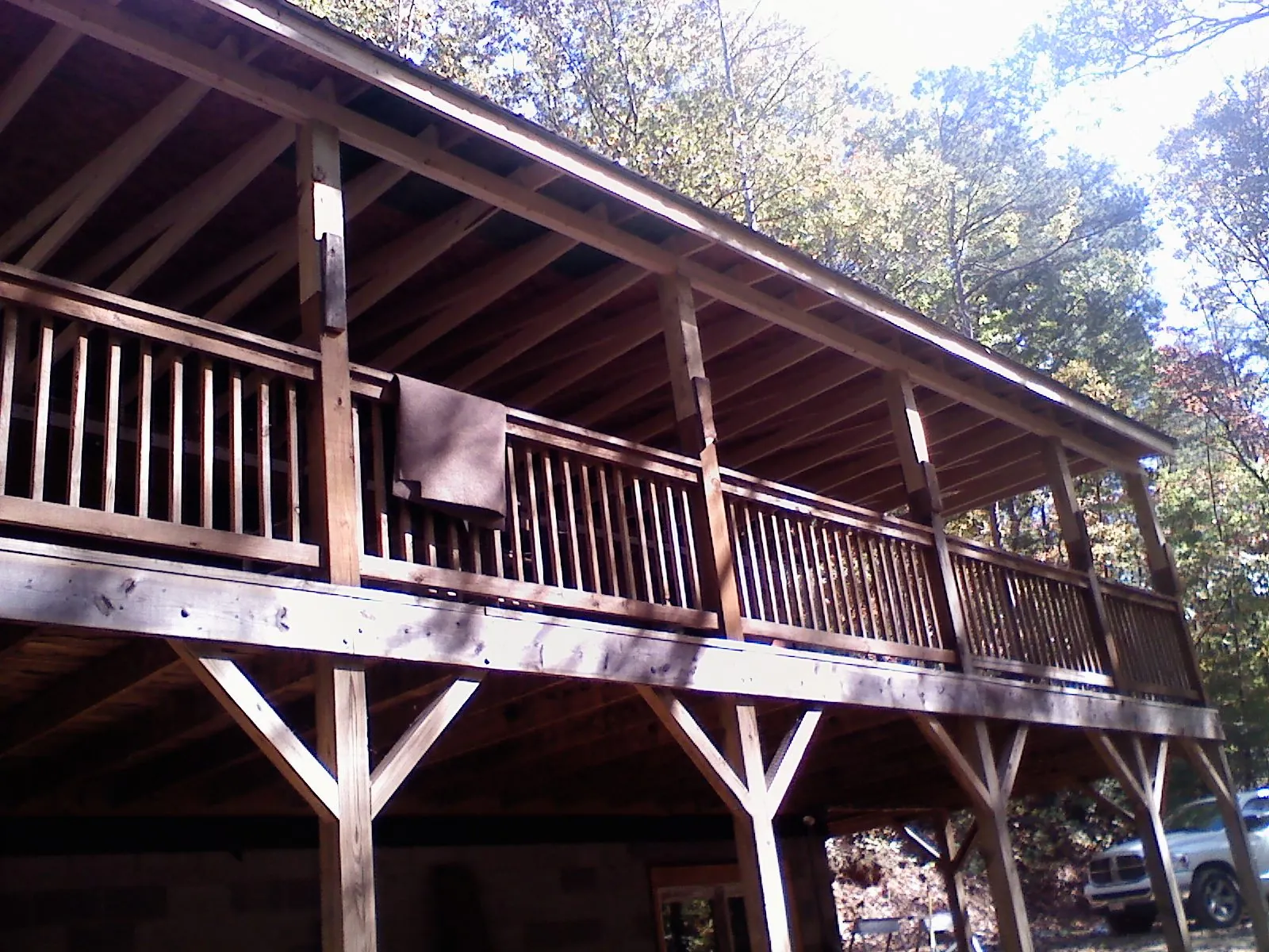 Timber framing under a new elevated porch and deck — Roof Leak Repair in Friend by Roofing Brothers
